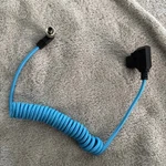 Kondor Blue Coiled D-tap To Locking Dc 2.1MM Right Angle Power Cable. Fixed Price $17.99.